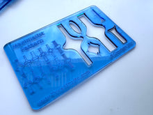 Load image into Gallery viewer, Close-up of layered metal ring shapes from TowedStudio jewelry templates