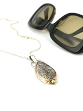 Load image into Gallery viewer, Indonesian Fossil Coral in sterling silver with a 14k gold filled bezel and accents.