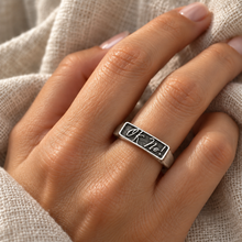 Load image into Gallery viewer, Woman's hand wearing a Sterling Silver Reminder Ring that it is OK to say No! made only by TowedSTudio.com in Tucson, Arizona.  Also available in gold.
